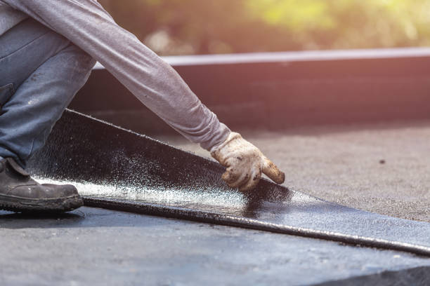 Professional Waterproofing technician working in North Judson, IN